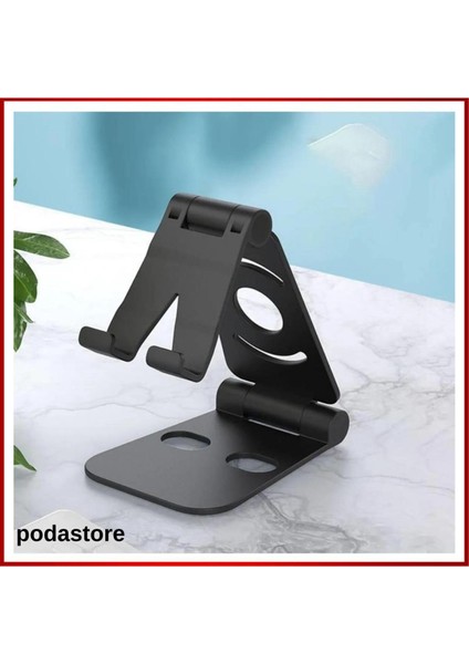 Katlanabilir Masa Üstü Telefon Standı. Siyah Plastik Materyal. Kolay Kullanım. Akrobat Siyah 1 Yıl T