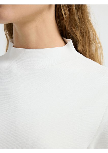 Boğazlı Kısa Kol Triko Bluz Kemik 11544535001 fiyatları