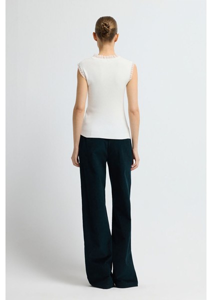 Tül Detaylı Kolsuz Triko Bluz Kemik 11544676001 indirimleri