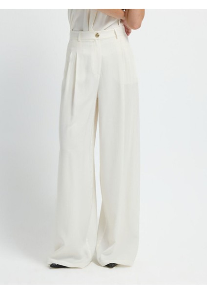 Pileli Geniş Paça Pantolon Kemik 15345748000 fiyatları