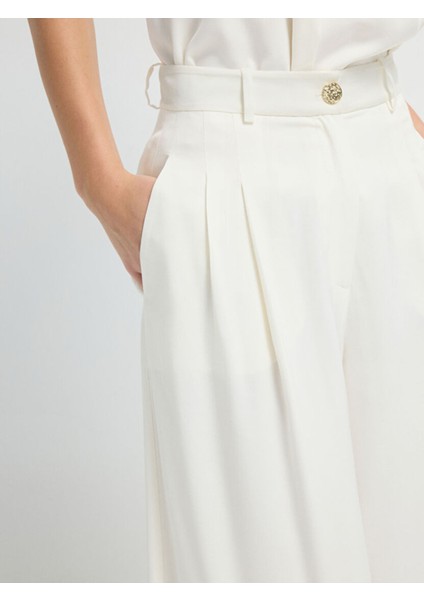 Pileli Geniş Paça Pantolon Kemik 15345748000 fırsatları