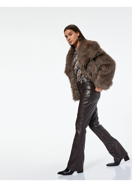 Slim Fit Normal Paça Kemerli Nervürlü Suni Deri Pantolon fiyatları