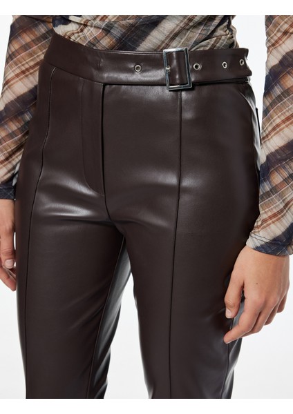 Slim Fit Normal Paça Kemerli Nervürlü Suni Deri Pantolon indirimleri