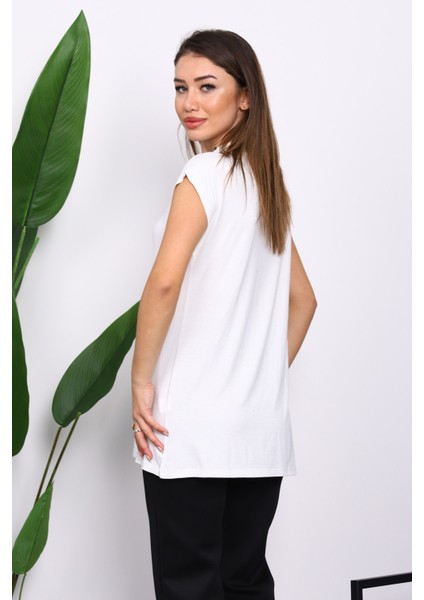 Ekru Dik Yaka Sıfır Kol İçlik fırsatları