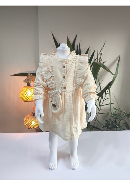 Uzun Kollu Dantel Detaylı Otantik Müslin Çantalı Kız Çocuk Elbisesi fırsatları