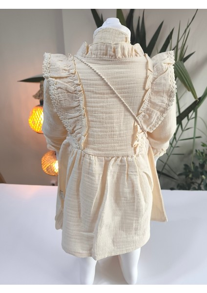 Uzun Kollu Dantel Detaylı Otantik Müslin Çantalı Kız Çocuk Elbisesi indirimleri