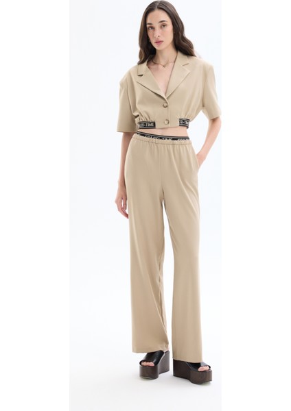 Beli Lastikli Yazı Detaylı Bol Paça Pantolon Bej