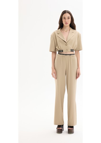 Beli Lastikli Yazı Detaylı Bol Paça Pantolon Bej