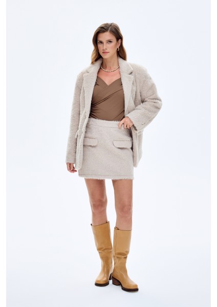 Cep Detaylı Tüylü Mini Etek Bej fiyatları