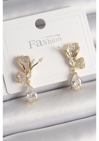 Pirinç Gold Renk Zirkon Taşlı Turna Kuşu Model Sallantı Detay Kadın Küpe - Lisinya