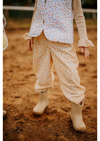 Lale Desenli Peluş Krem Yelek fırsatları