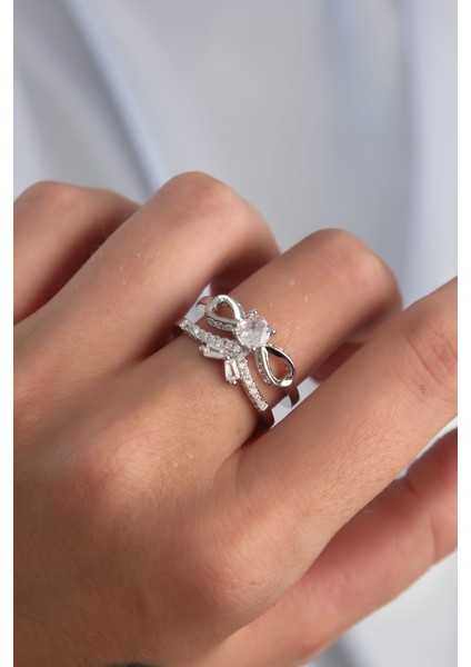 bulurum pirinç ayarlamalı gümüş renk zirkon taşlı 2li görünüm fiyonk yüzük fiyatları