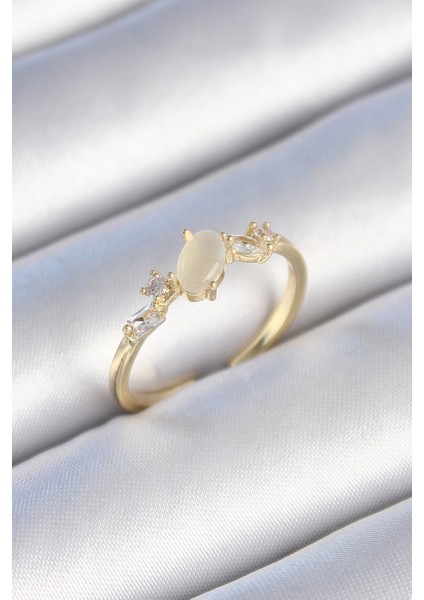 bulurum pirinç gold renk zirkon taşlı oval beyaz mineli kadın yüzük