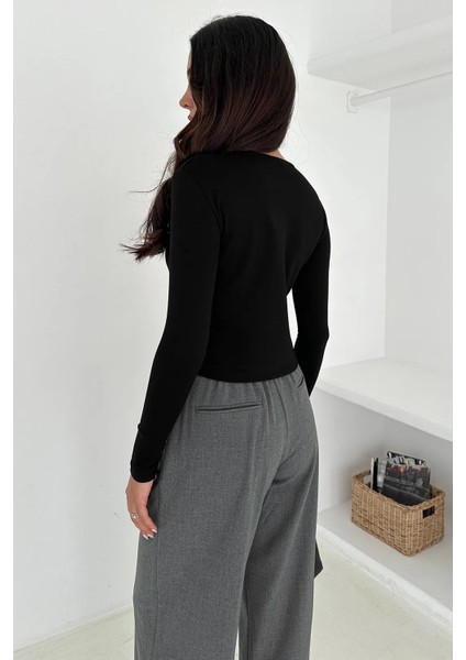 Kadın Sivri Etek Uçlu Düğmeli Bluz – Modern & Şehirli Stil