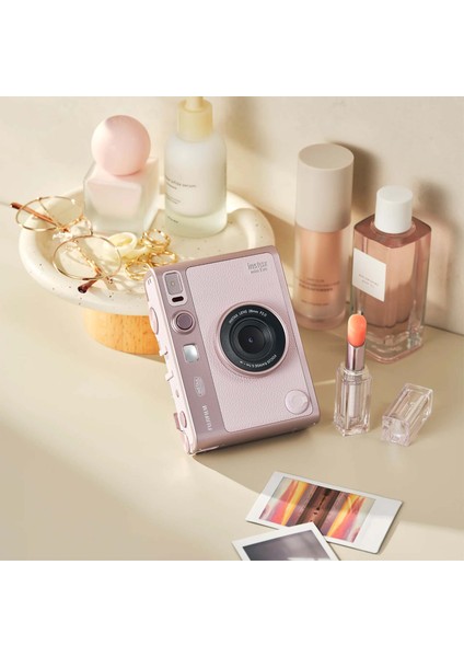 Instax Mini Evo Gentle Rose Hybrit Fotoğraf Makinesi Laporta Albüm 20'li Film Vekıskaçlı Resim Standı Seti indirimleri