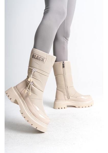 Lucy Lastikli Fermuarlı Paraşüt Kumaş Rugan Kadın Bot Ckt - Krem