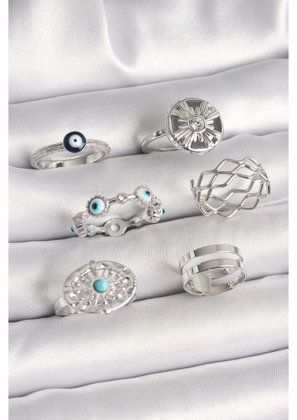 bulurum pirinç gümüş renk nazar boncuk zirkon taş detaylı dalga figür kadın yüzük kombini