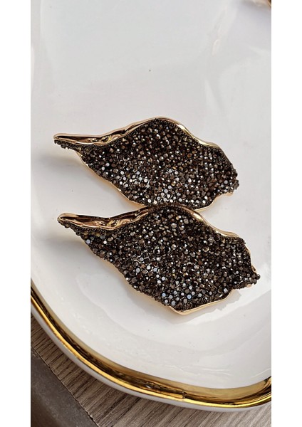 Şık ve Göz Alıcı Siyah Zirkon Taşlı Altın Detaylı Kanat Küpe