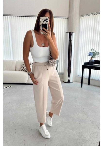 Bej Beli Lastikli Modal Kumaş Çımalı Bilek Pantolon