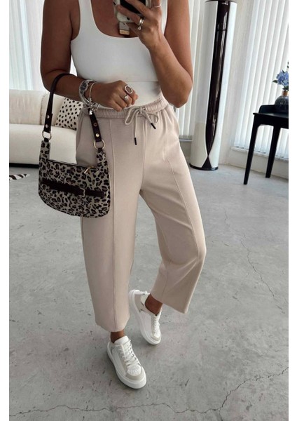 Bej Beli Lastikli Modal Kumaş Çımalı Bilek Pantolon fiyatları