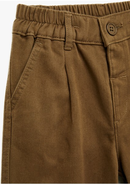 Beli Lastikli Düğmeli Pamuklu Havuç Kesim Pantolon modelleri