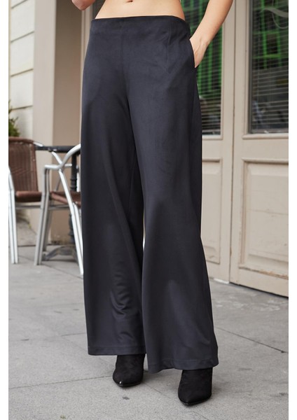 Kadın Süet Dokulu Kumaş Yüksek Bel Yan Cepli Beli Lastikli Bol Paça Palazzo Pantolon-Siyah indirimleri