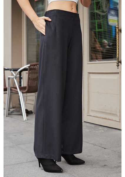 Kadın Süet Dokulu Kumaş Yüksek Bel Yan Cepli Beli Lastikli Bol Paça Palazzo Pantolon-Siyah