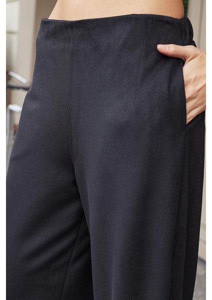 Kadın Süet Dokulu Kumaş Yüksek Bel Yan Cepli Beli Lastikli Bol Paça Palazzo Pantolon-Siyah