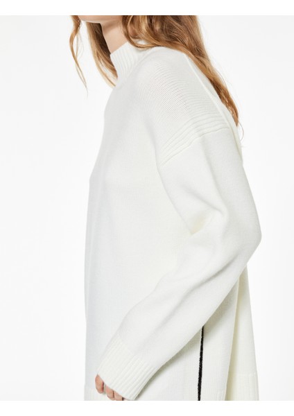 Uzun Kollu Dik Yaka Yırtmaç Detaylı Oversize Triko Tunik indirimleri