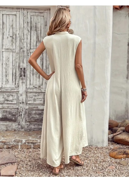 Kadın Kısa Kollu Önden Düğmeli Paçaya Doğru Geniş Cepli Uzun Bürümcük Tulum fırsatları