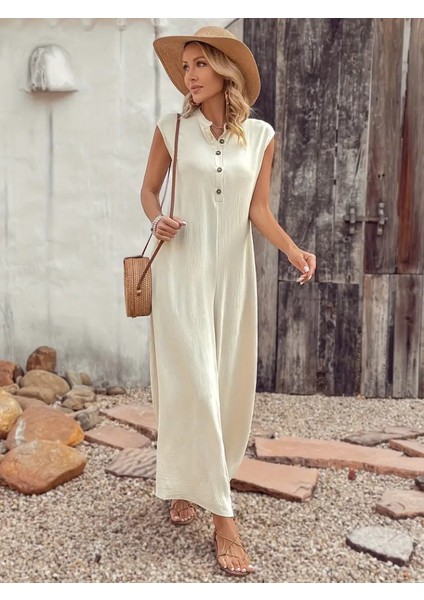 Kadın Kısa Kollu Önden Düğmeli Paçaya Doğru Geniş Cepli Uzun Bürümcük Tulum