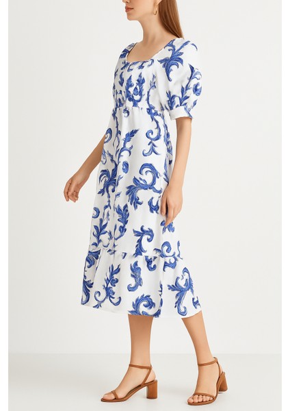 Önü ve Arkası U Kare Yaka Desenli Volanlı Lastikli Kısa Kol Göğsü Gipeli Elbise fiyatları