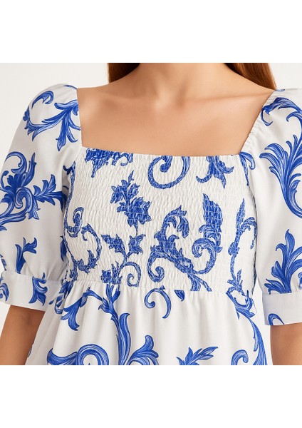 Önü ve Arkası U Kare Yaka Desenli Volanlı Lastikli Kısa Kol Göğsü Gipeli Elbise modelleri