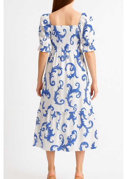 Önü ve Arkası U Kare Yaka Desenli Volanlı Lastikli Kısa Kol Göğsü Gipeli Elbise indirimleri