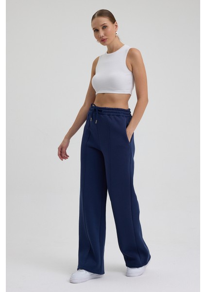 Kadın Yüksek Bel Nervürlü Kışlık Polarlı Paça Dikişli Bol Paça Eşofman Altı Lacivert indirimleri