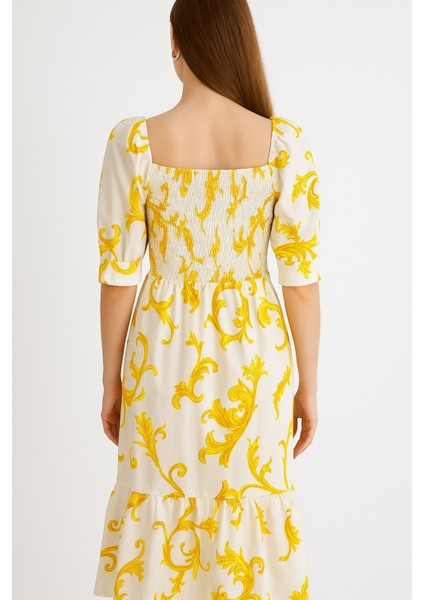 Önü ve Arkası U Kare Yaka Desenli Volanlı Lastikli Kısa Kol Göğsü Gipeli Elbise indirimleri