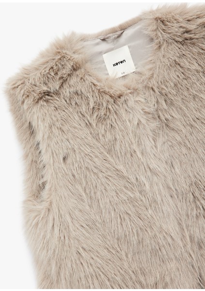 Düğmeli Bisiklet Yaka Kolsuz Suni Kürk Crop Yelek indirimleri