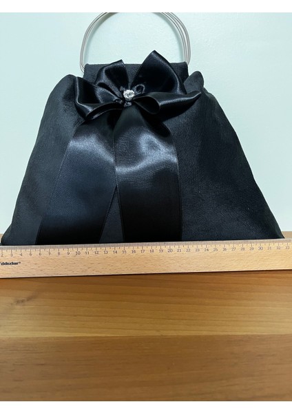 Siyah Nubuk Kumaş Çanta Fiyonklu Taşlı Metal Saplı Çanta fırsatları