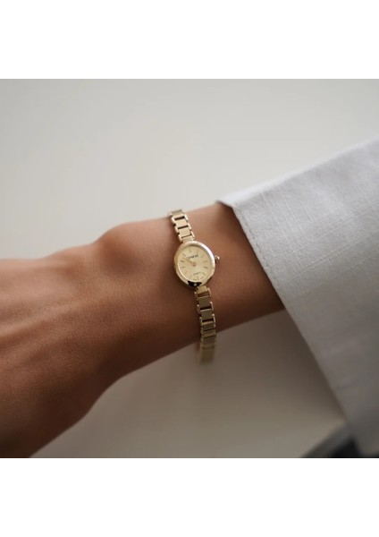 Geneve Zarif Oval Kadran Altın Saat