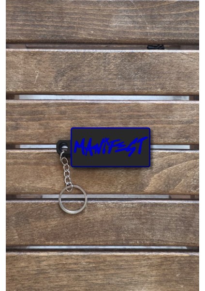 Manifets Grubu Manifestival Temalı Sert Plastik Anahtarlık Mavi– Özel Tasarım, Dayanıklı, Şık fiyatları