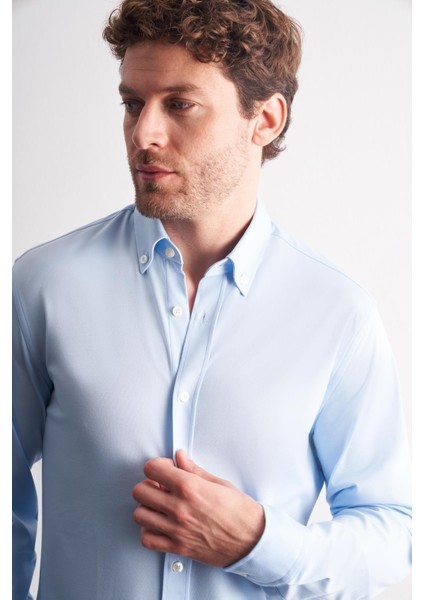 Mavi Düğmeli Yaka Örme Uzun Kol Performans Ürün Slim Fit Esnek Gömlek 1004255270 modelleri
