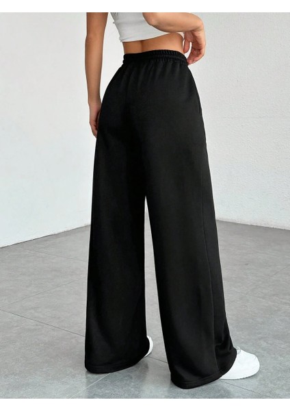 Kadın Baggy Fit 3 Iplik Beli Lastikli Geniş Paça Eşofman fırsatları