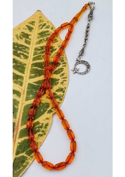 Şeffaf Turuncu Kapsül Kesim Ay Yıldız Alpaka Püskül Kehribar Tespih fırsatları