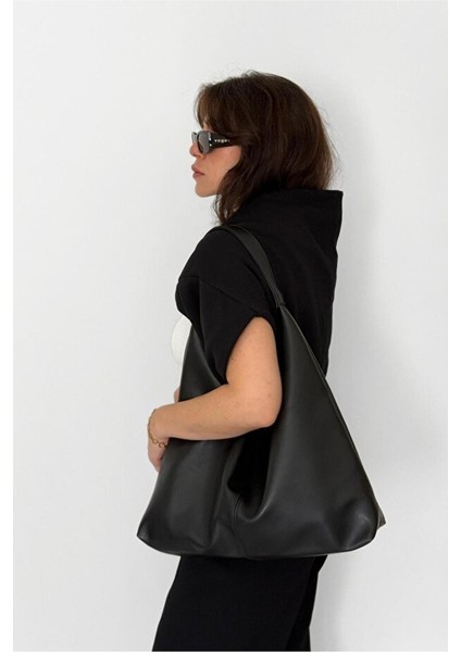 Salaş Görünümlü ve Geniş Hacimli Suni Deri Kadın Shopper Omuz Çantası fiyatları