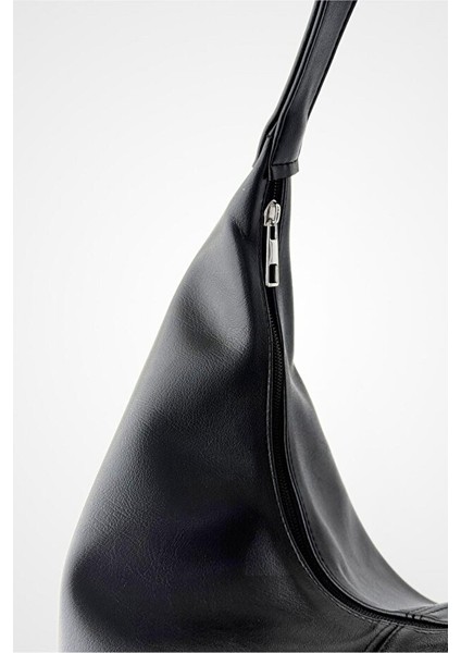 Salaş Görünümlü ve Geniş Hacimli Suni Deri Kadın Shopper Omuz Çantası indirimleri