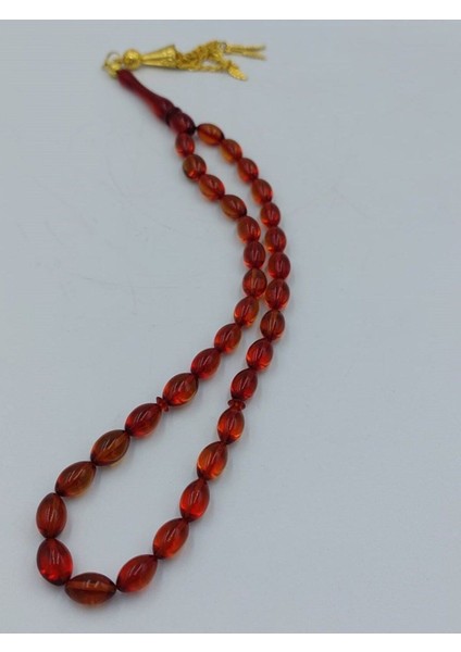 Şeffaf Kırmızı Arpa Kesim Alpaka Püskül Kehribar Tespih fiyatları