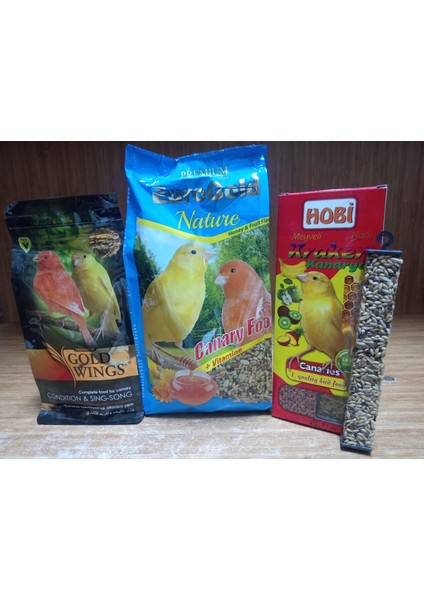 Ballı ve Meyveli Kanarya Yemi 500 Gram 2 Adet+1 Paket Ballı Kanarya Krakeri ( 3 Adet) +150 Gram Kanarya Kondisyon ve Öttürücü Yem Katkısı