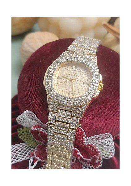 Altın Renk Taş Kaplama Oval Kasa Tasarım Kadın Kol Saati modelleri