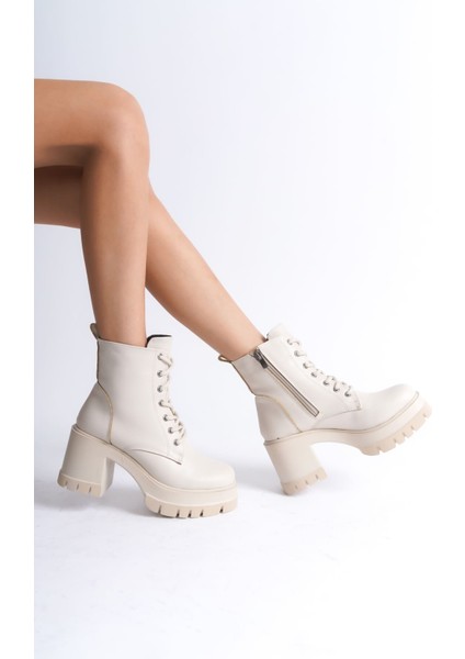 Lauren Bağcıklı Fermuarlı Ortopedik Taban Suya ve Soğuğa Dayanıklı Topuklu Cilt Kadın Bot Kt Krem indirimleri