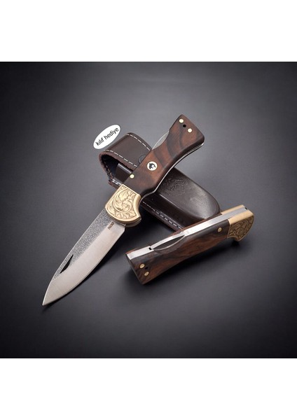 N690 Böhler Çelik Gravürlü Balçıklı Kilitli Yaylı Çakı | Dayanıklı El Işçiliği Çakı Modelleri